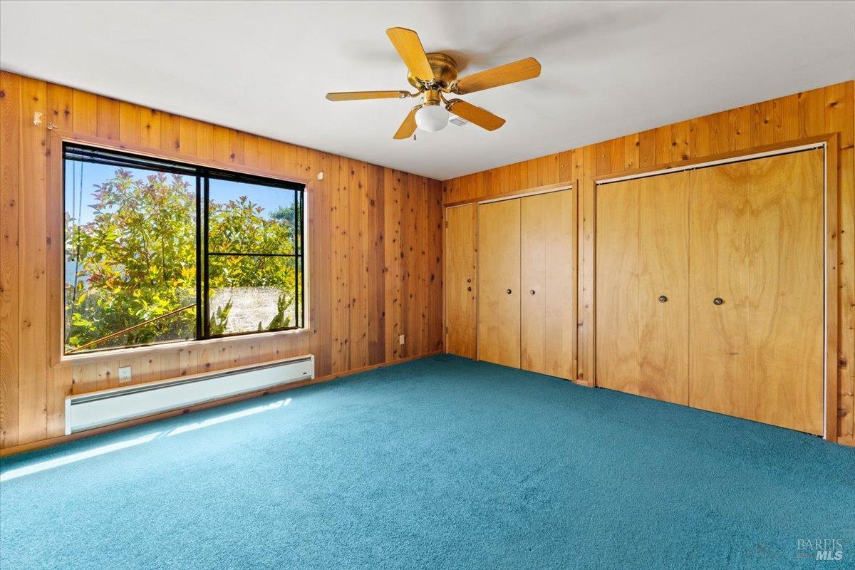 125 Cedar Gulch Road Hayfork, CA 96041 - Photo 52 of 57 an empty room with window and a ceiling fan