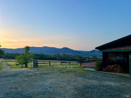 a view of swimming pool from a lake view