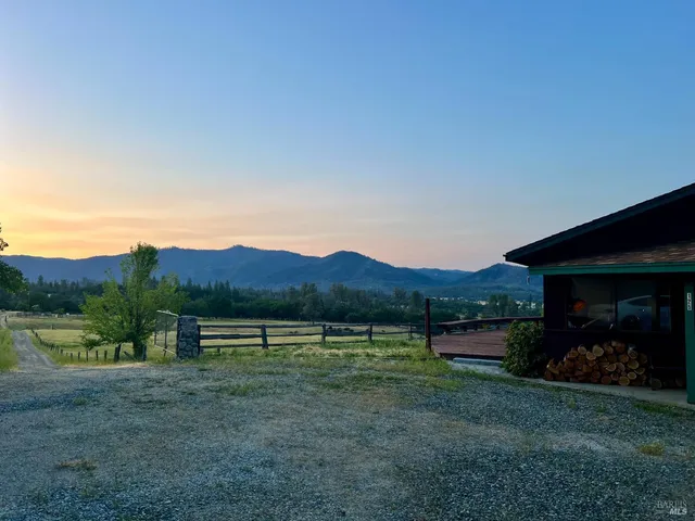 a view of swimming pool from a lake view