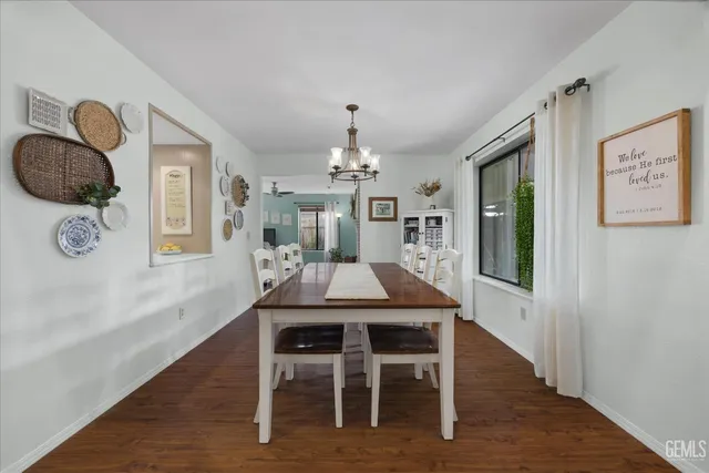 a kitchen with cabinets and window