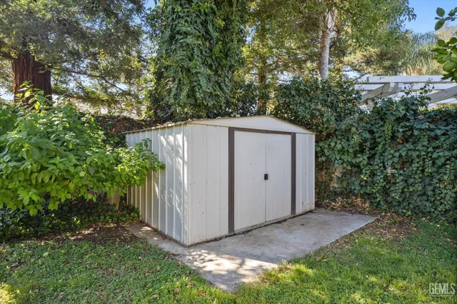 an aerial view of a house with swimming pool