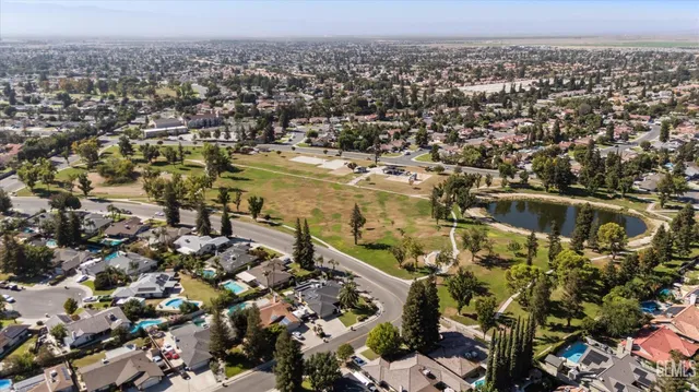 a view of a yard and front of house