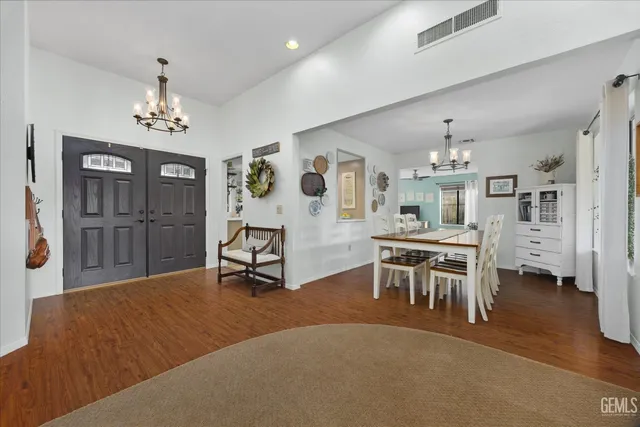 a bedroom with a bed couch and a window