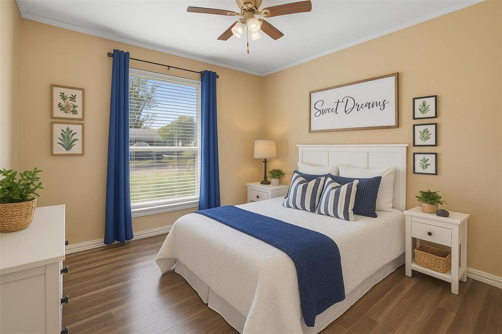 124 Lou Street Sulphur Springs, TX 75482 - Photo 17 of 33 a large bed sitting in a bedroom next to a window