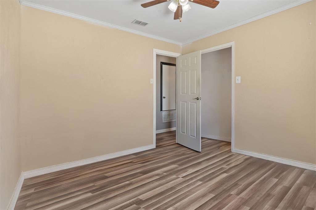 124 Lou Street Sulphur Springs, TX 75482 - Photo 19 of 33 wooden floor in an empty room