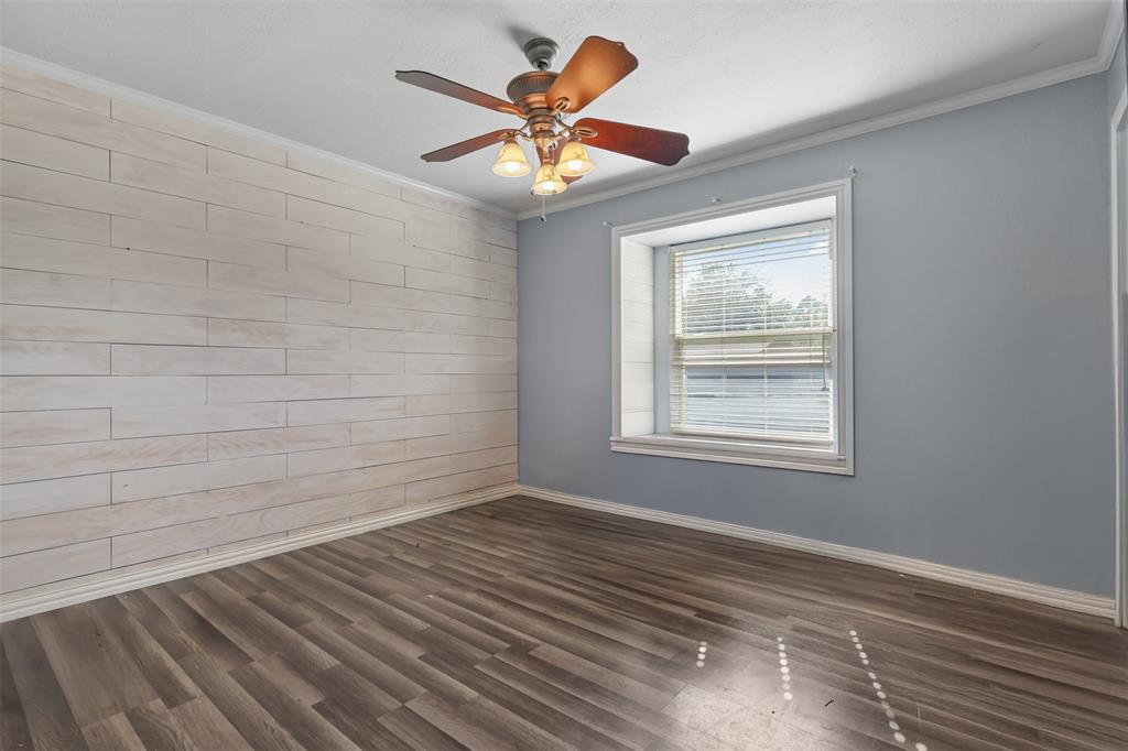 124 Lou Street Sulphur Springs, TX 75482 - Photo 21 of 33 a view of an empty room with a window