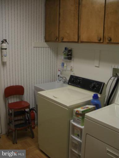 2600 Rigging Drive Annapolis, MD 21401 - Photo 16 of 23 Laundry Area with utility sink & garage door