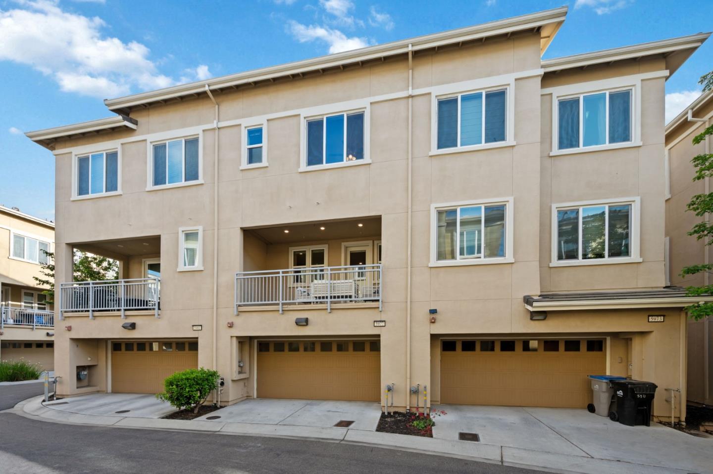 5977 Larkstone Loop San Jose, CA 95123 - Photo 6 of 63 a front view of a building with windows