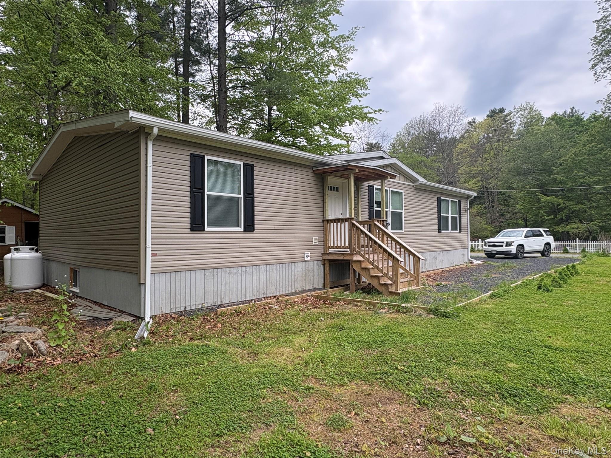 40 4th Street Godeffroy, NY 12729 - Photo 17 of 17 Renovated ranch-style manufactured home with private driveway