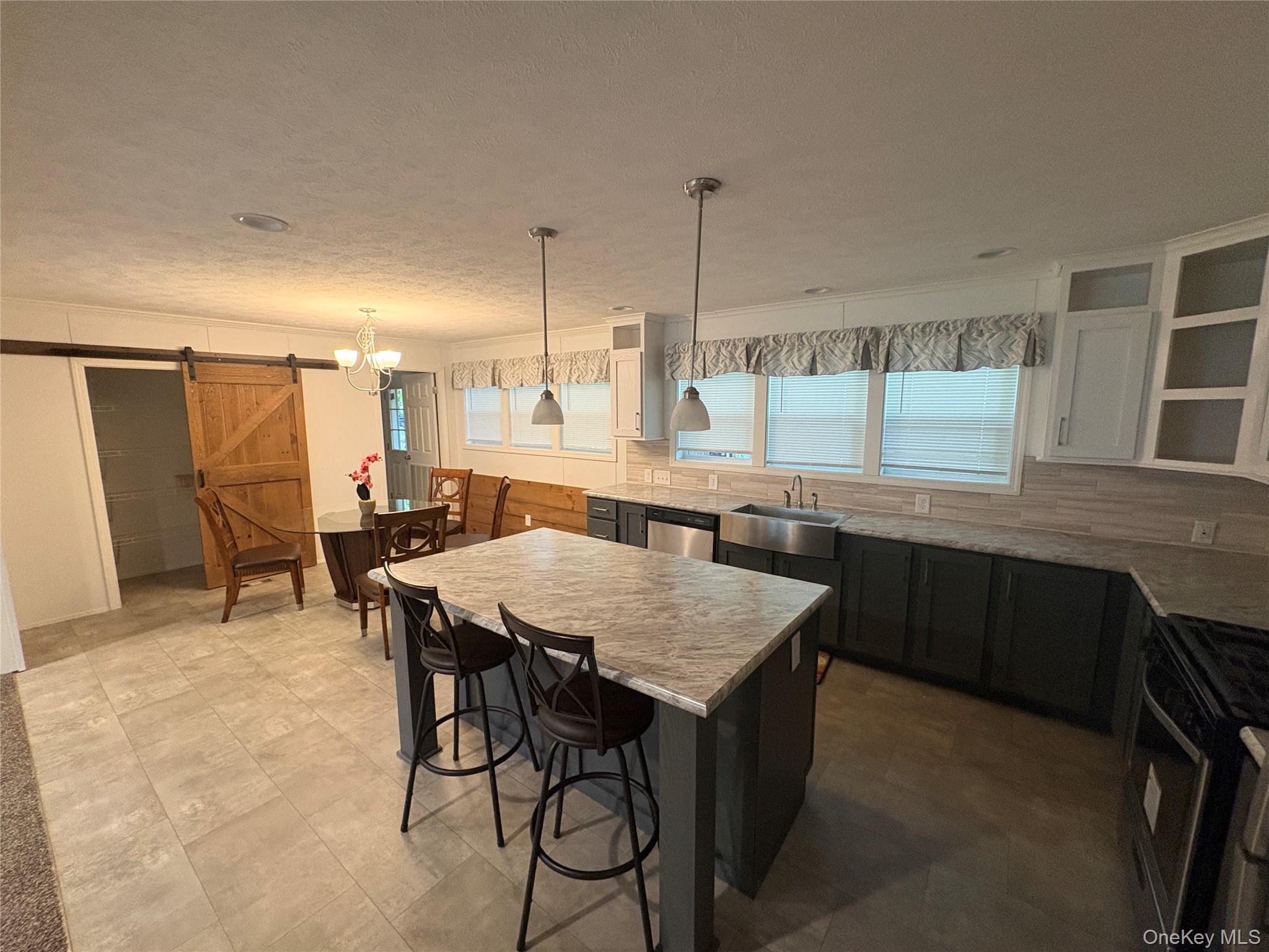 40 4th Street Godeffroy, NY 12729 - Photo 3 of 17 Bright dining area adjacent to kitchen and living room.