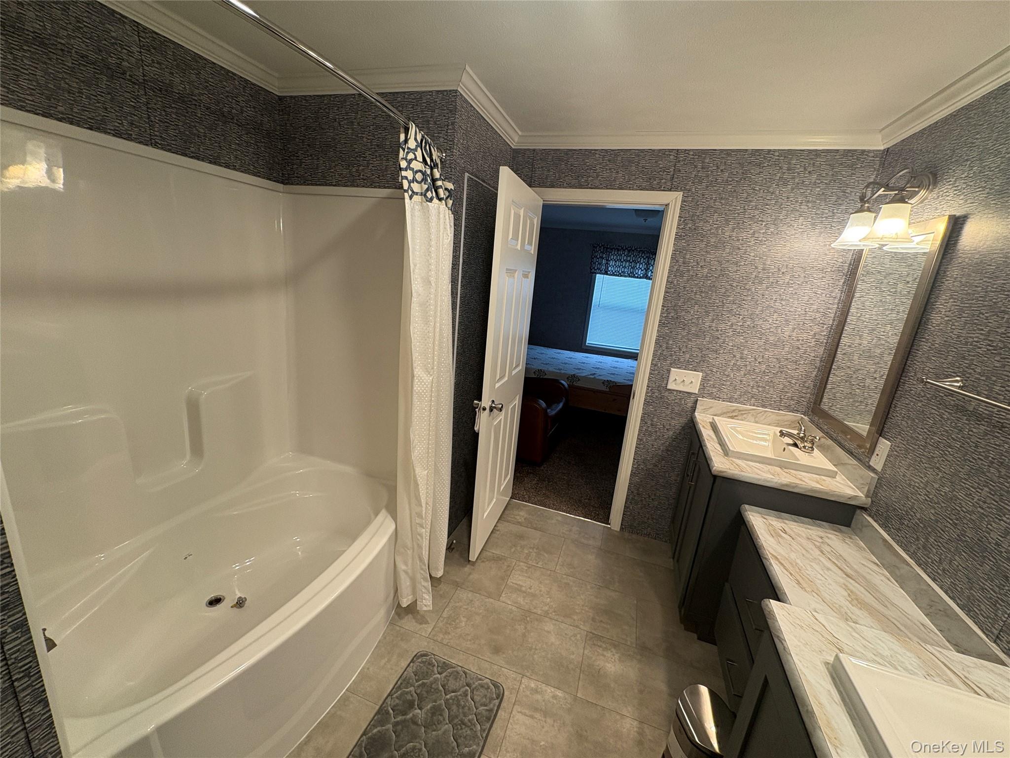 40 4th Street Godeffroy, NY 12729 - Photo 5 of 17 Updated bathroom with modern vanity and full tub