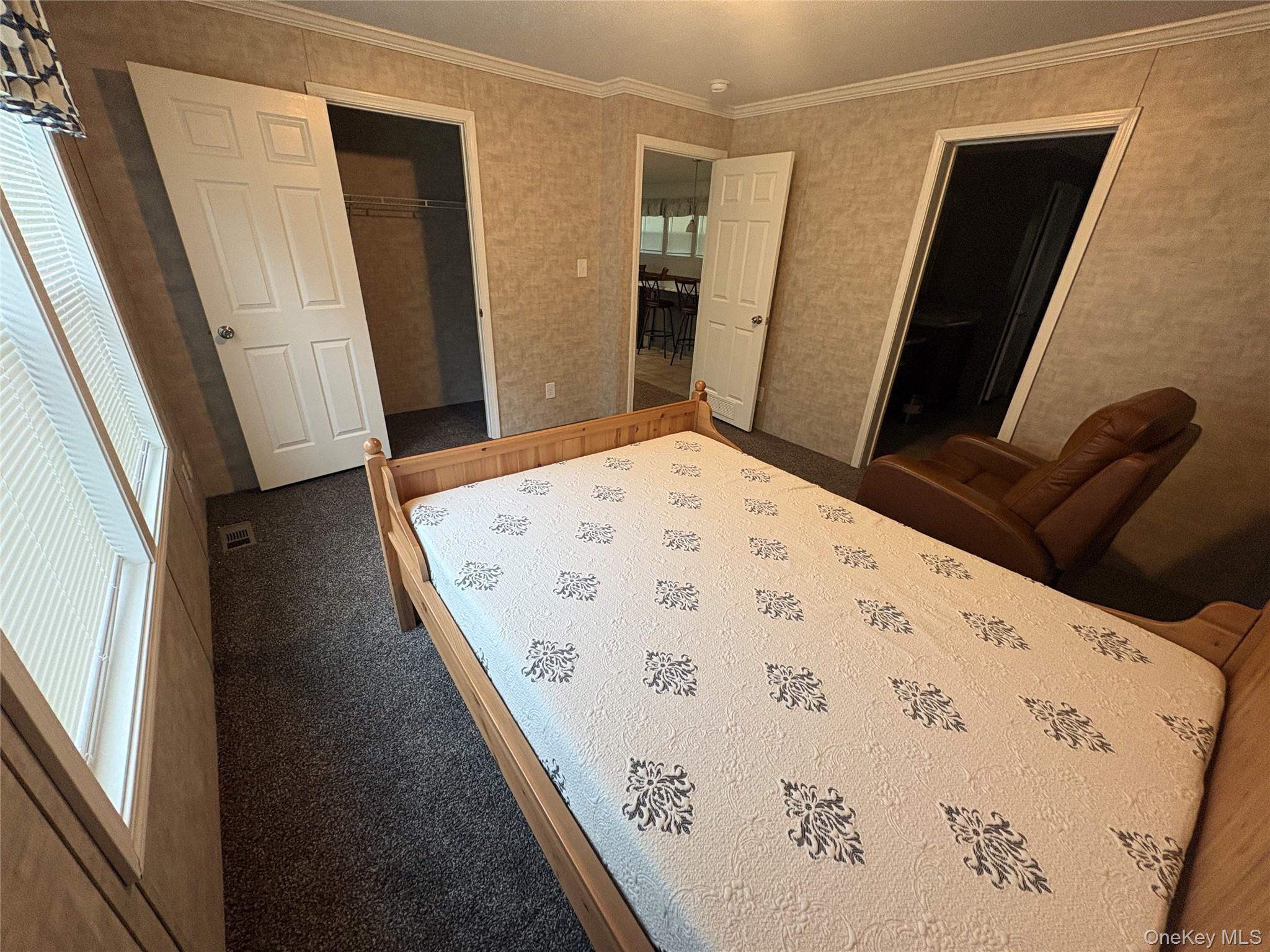 40 4th Street Godeffroy, NY 12729 - Photo 7 of 17 Comfortable furnished bedroom with closet space and natural light