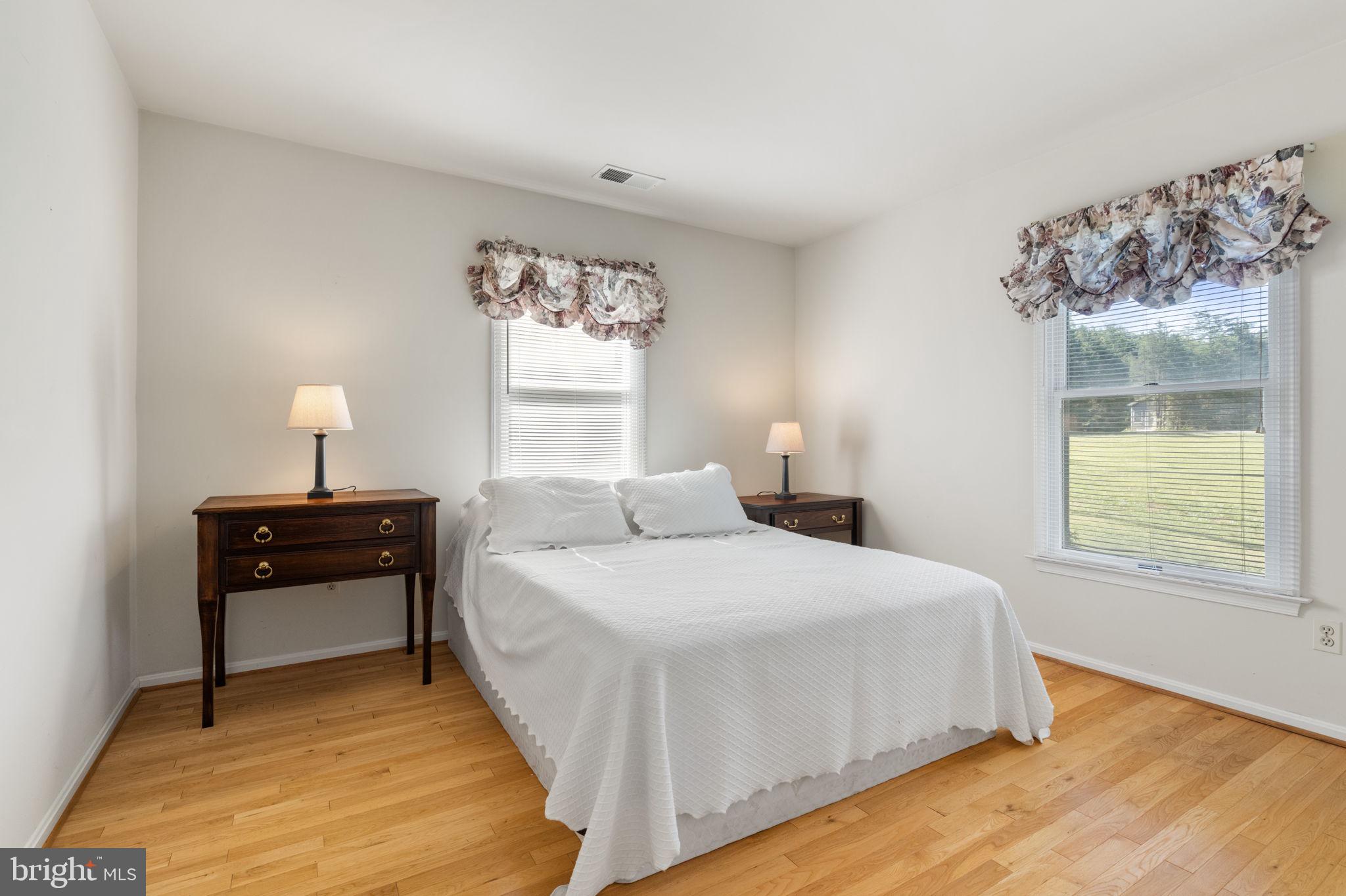 161 Troy Road Louisa, VA 23093 - Photo 23 of 60 a bedroom with a bed and a window