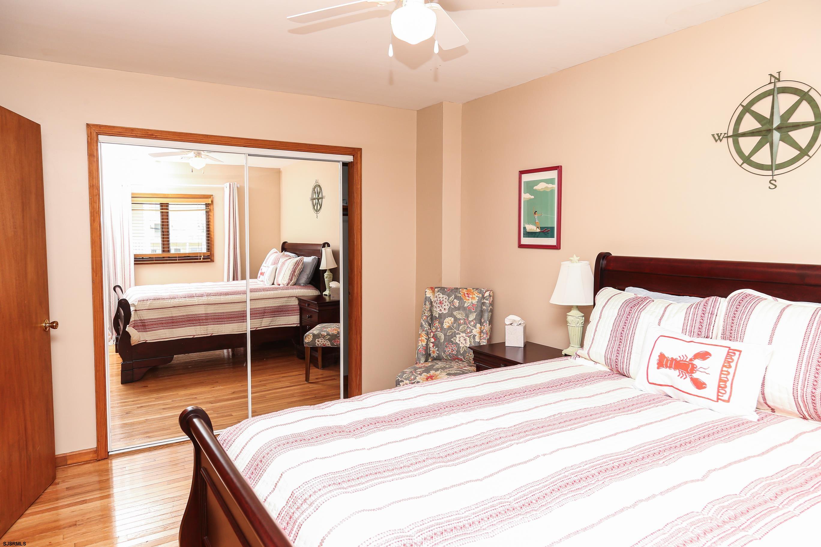 243 6th Street South Brigantine, NJ 08203 - Photo 20 of 28 a bedroom with a bed and a dresser