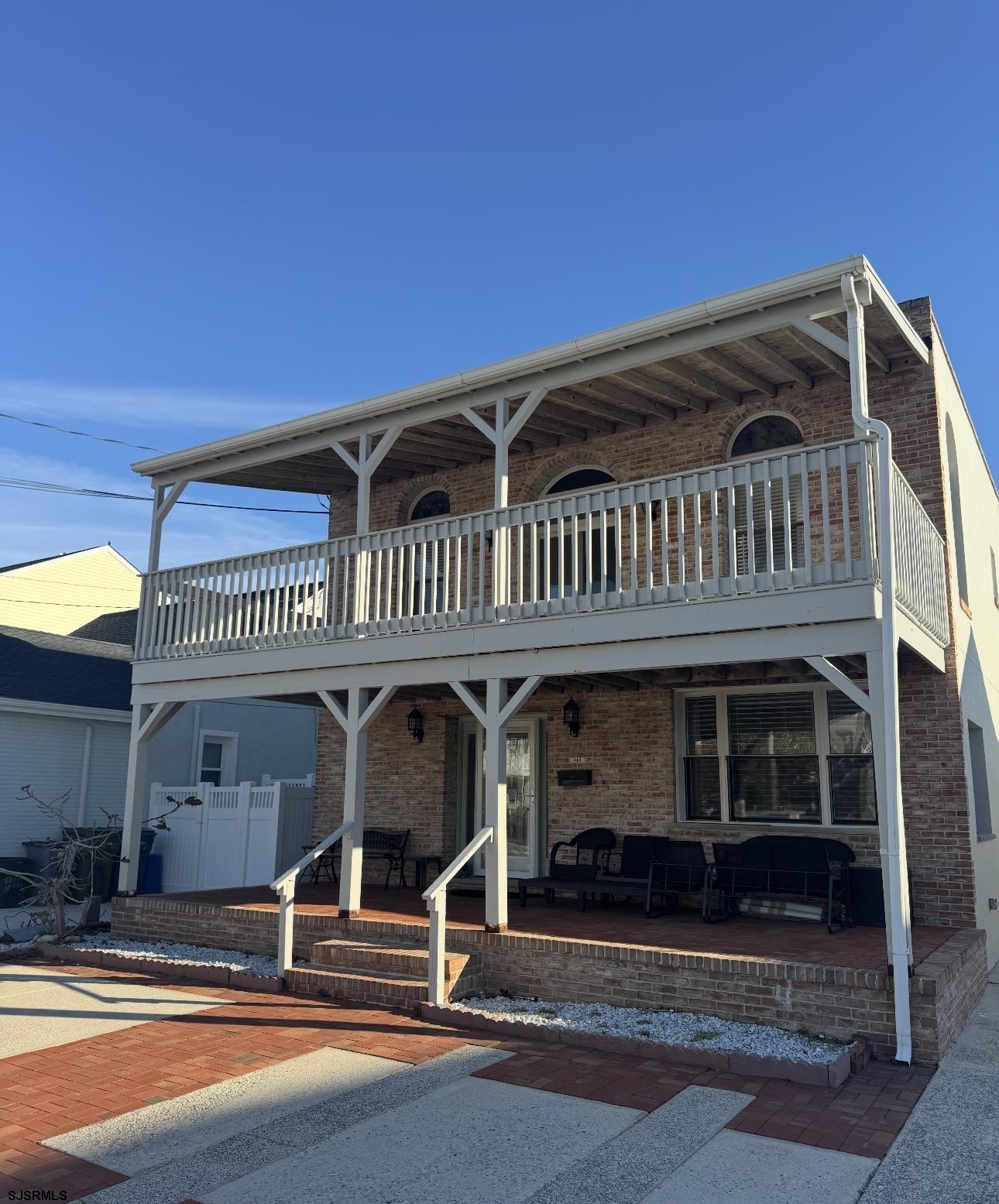 243 6th Street South Brigantine, NJ 08203 - Photo 3 of 28 a view of a building with entryway