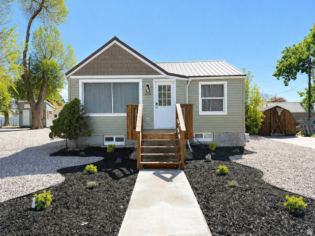 479 South 100 West Vernal, UT 84078 - Photo 1 of 13 View of front facade featuring a metal roof and an outbuilding