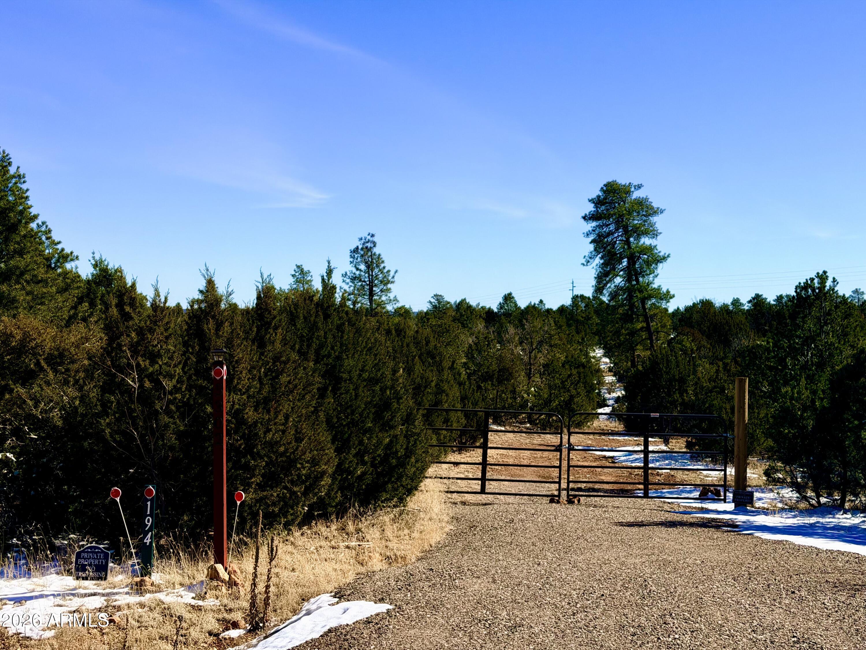 5302 Sunset Ridge Loop, Unit 194 Happy Jack, AZ 86024 - Photo 3 of 30 Drive gate on Sunset Ridge Loop side
