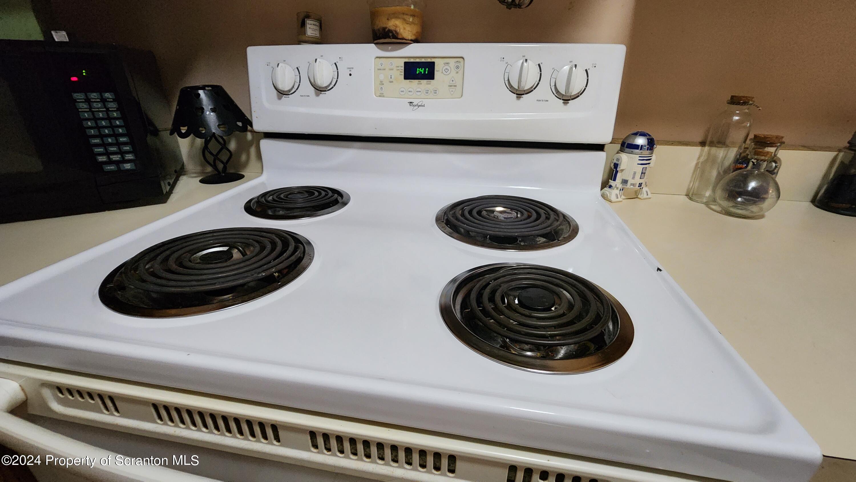 633 Meshopany Ridge Road Meshoppen, PA 18630 - Photo 16 of 41 a washing machine sitting next to a white washer and dryer