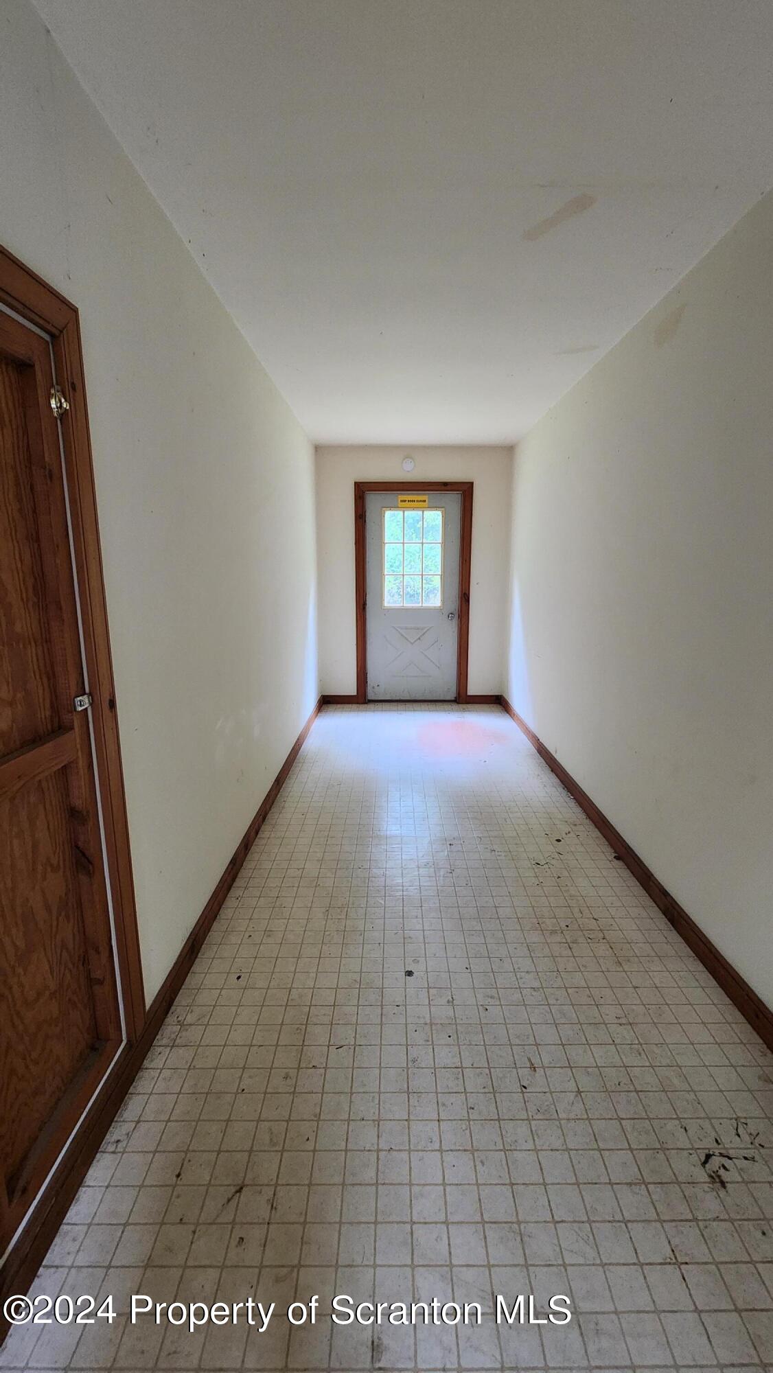 633 Meshopany Ridge Road Meshoppen, PA 18630 - Photo 17 of 41 a view of a room with a window