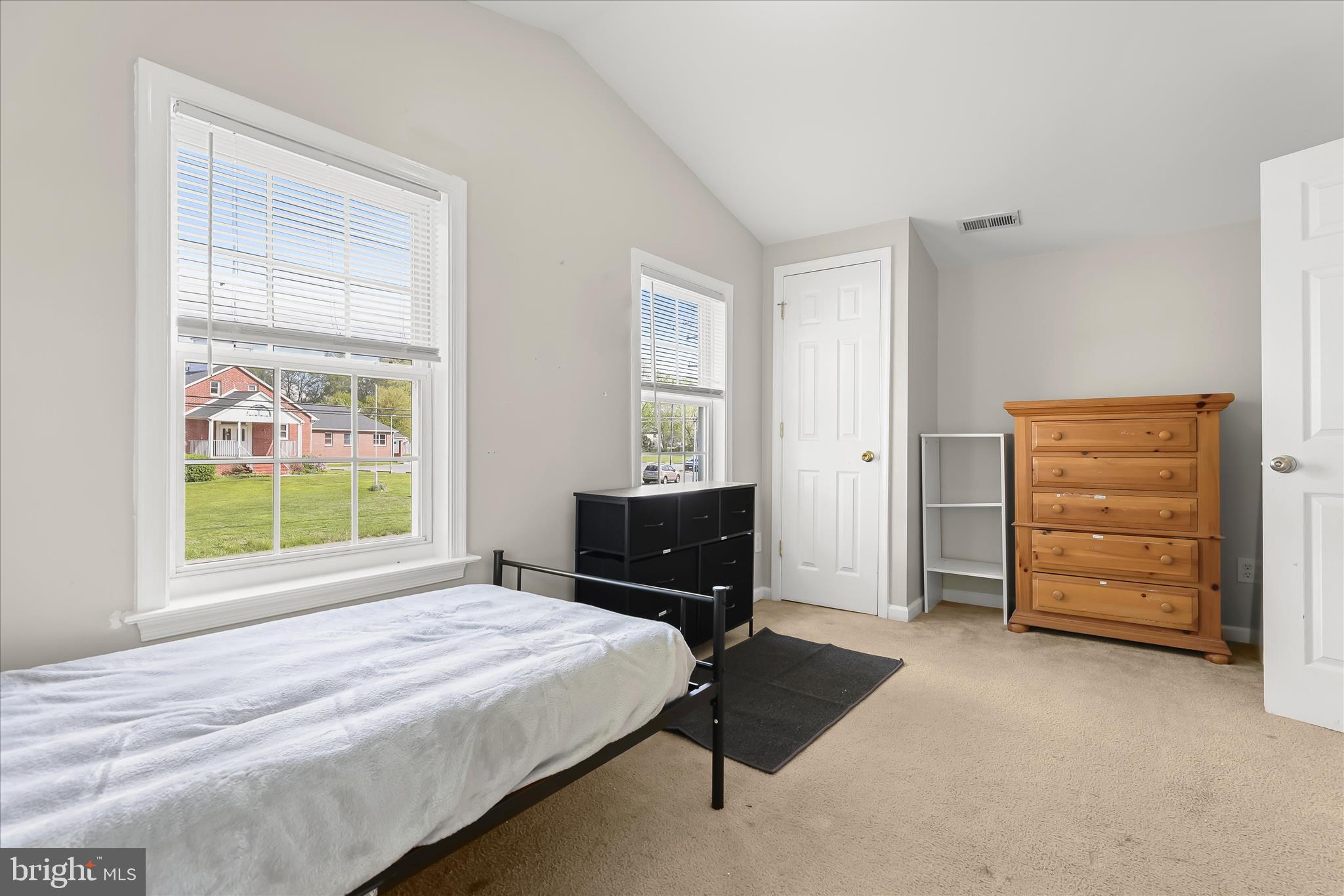207 Mechanics Valley Road North East, MD 21901 - Photo 22 of 32 a bedroom with a bed and a window