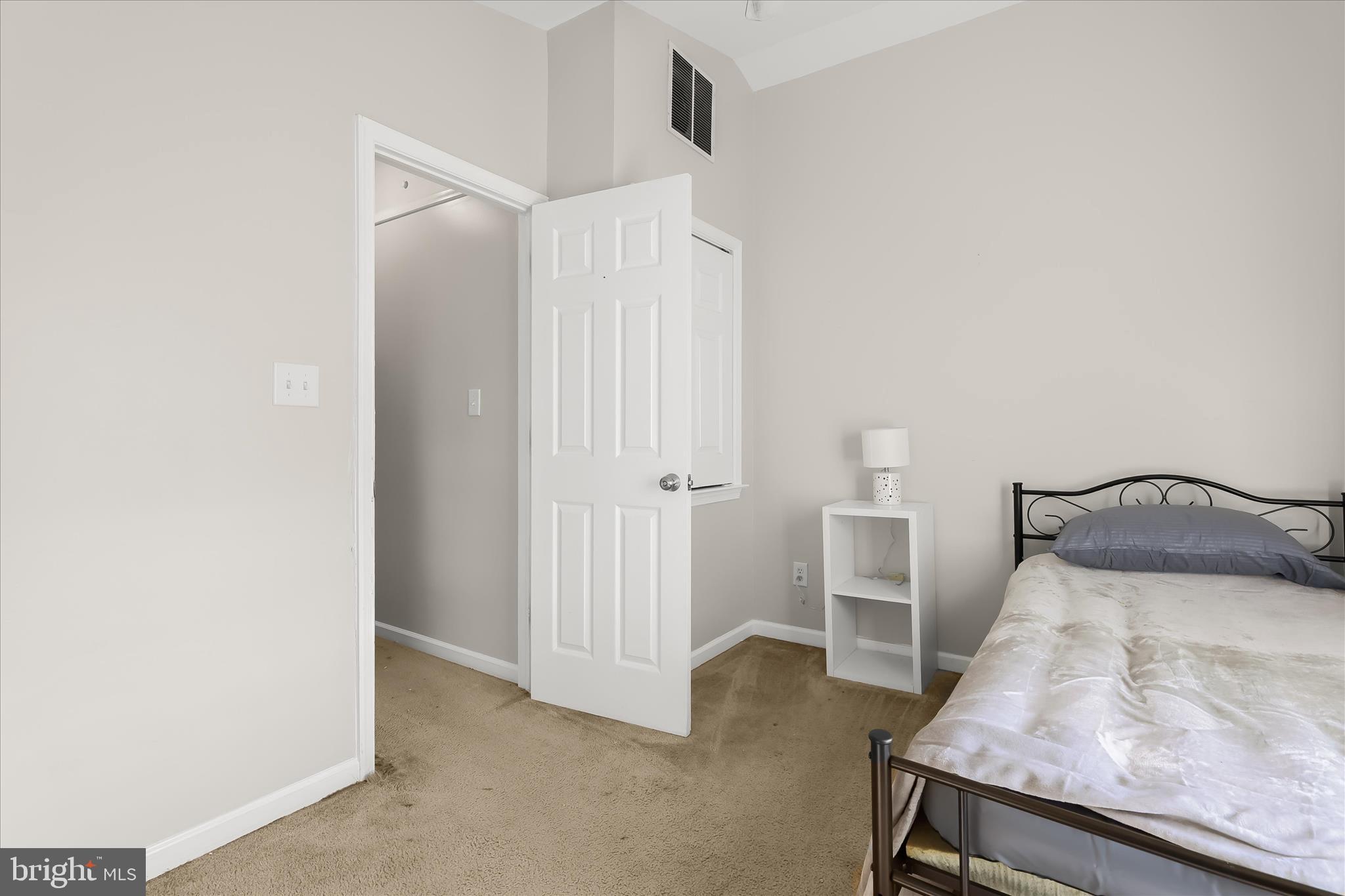 207 Mechanics Valley Road North East, MD 21901 - Photo 24 of 32 a bedroom with a bed and a table