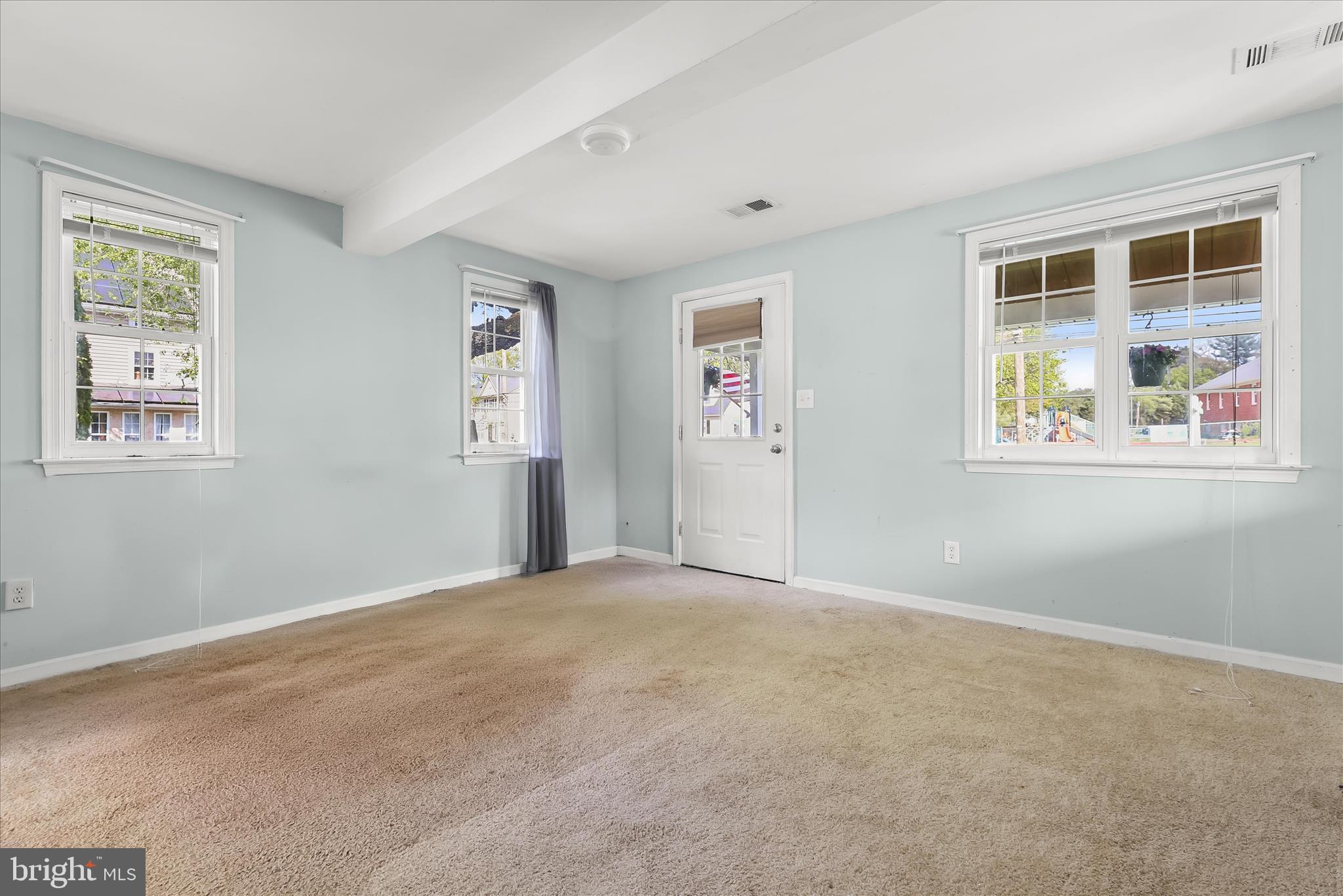 207 Mechanics Valley Road North East, MD 21901 - Photo 6 of 32 a view of an empty room with a window