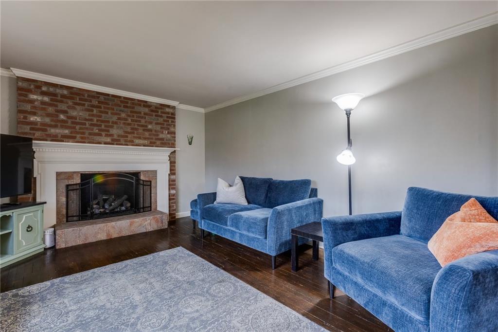 193 Goldsmith Road Pittsburgh, PA 15237 - Photo 11 of 42 A gas fireplace is a beautiful addition to the living room.