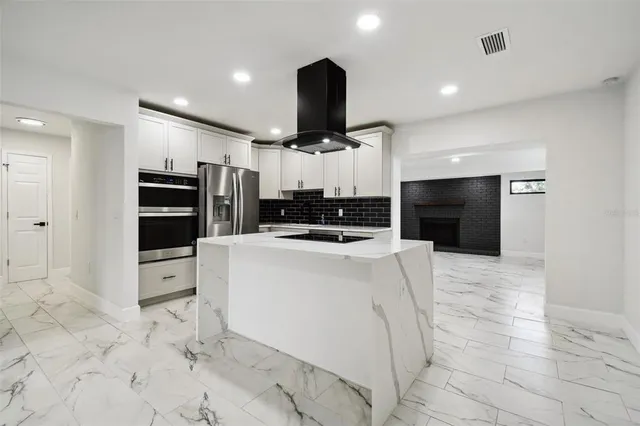 a view of empty room with windows