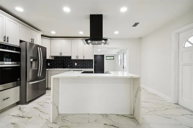 a view of a room with windows