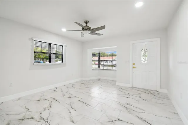 a view of a house with a yard and garage