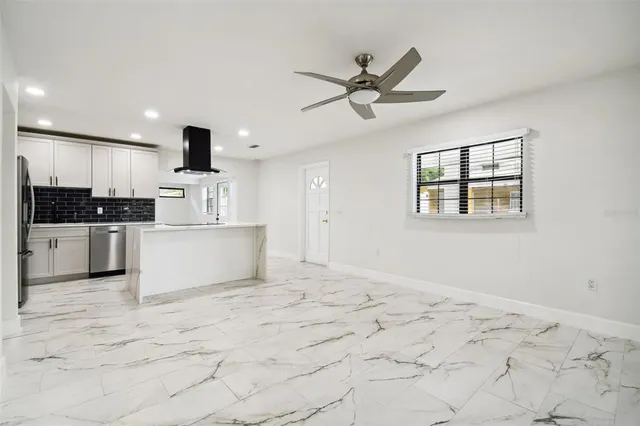 a view of outdoor space with deck and yard