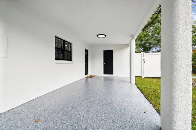 a view of a bathroom from a hallway