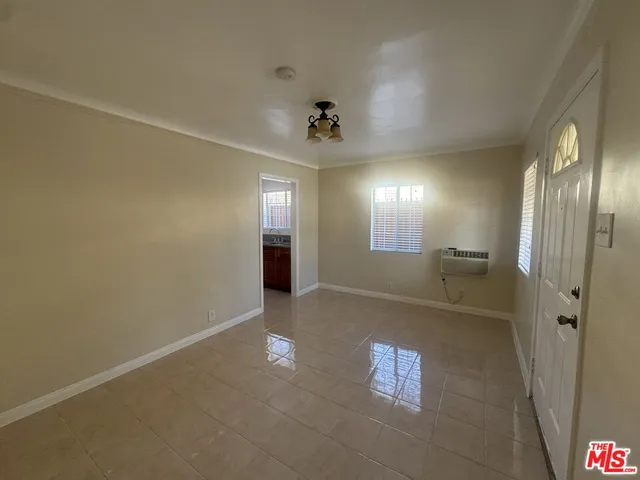 a kitchen with a sink stove and refrigerator