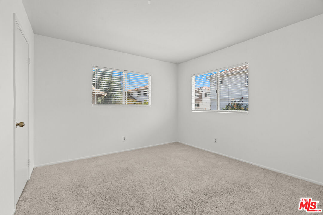 4508 Apricot Road, Unit B Simi Valley, CA 93063 - Photo 12 of 17 an empty room with windows