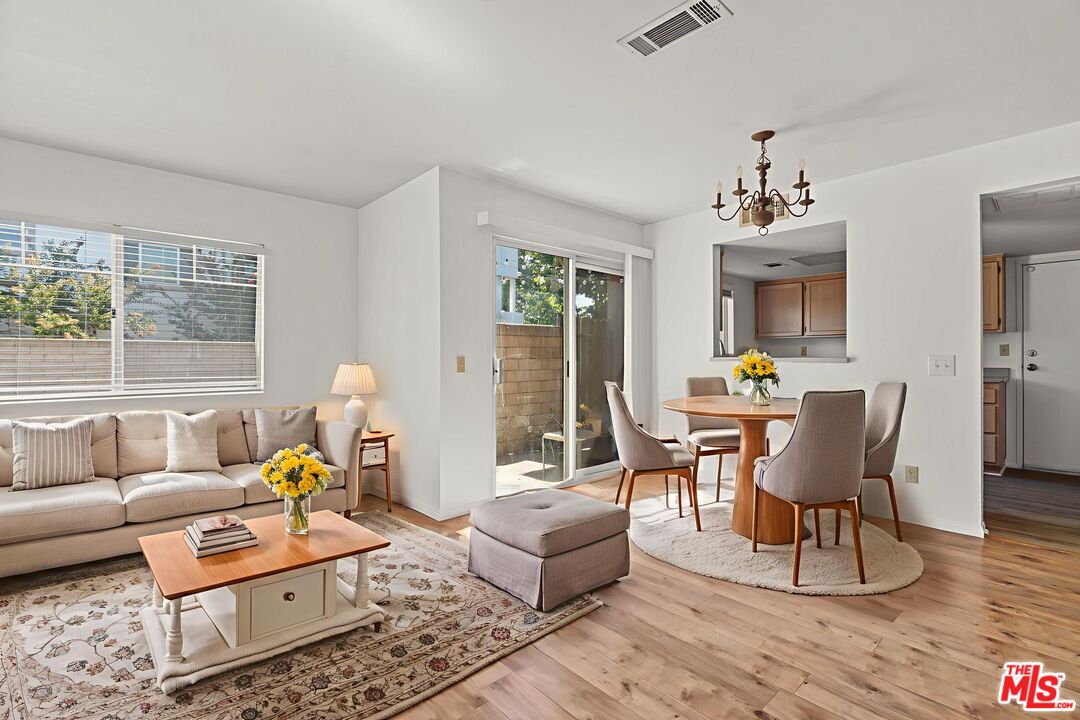 4508 Apricot Road, Unit B Simi Valley, CA 93063 - Photo 2 of 17 a living room with furniture and wooden floor