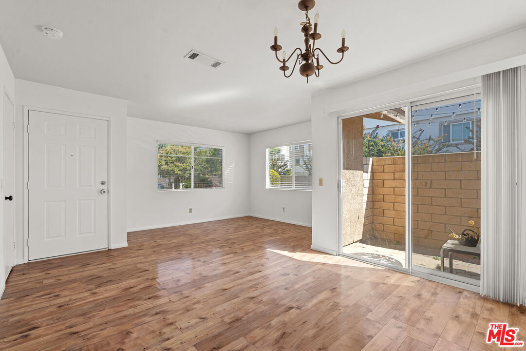 4508 Apricot Road, Unit B Simi Valley, CA 93063 - Photo 3 of 17 a view of an empty room with a window