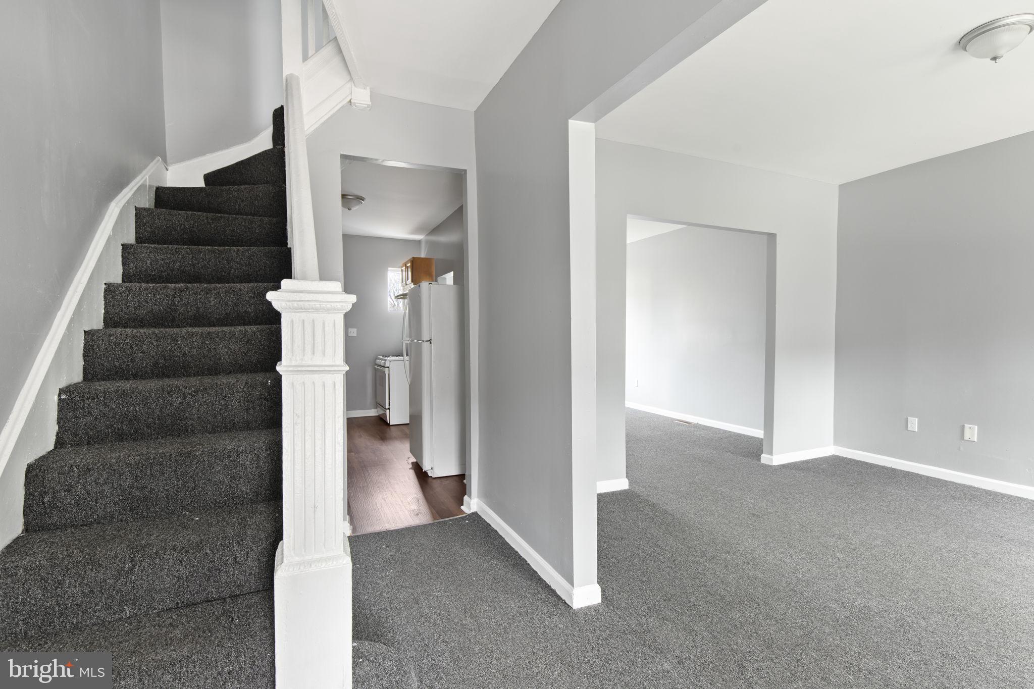1209 North Dukeland Street Baltimore, MD 21216 - Photo 2 of 21 a view of a hallway to of the house