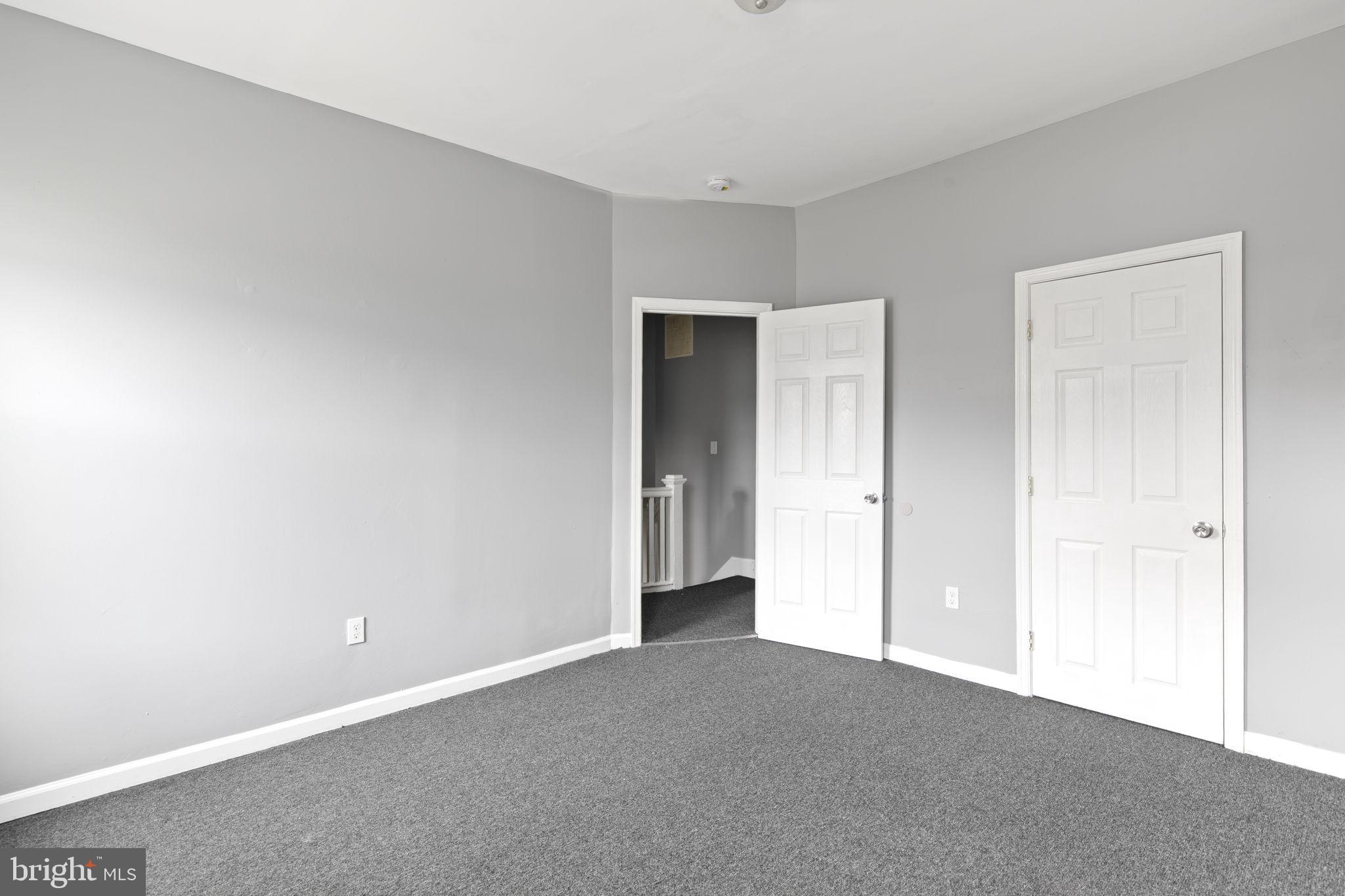 1209 North Dukeland Street Baltimore, MD 21216 - Photo 9 of 21 a view of an empty room and closet area
