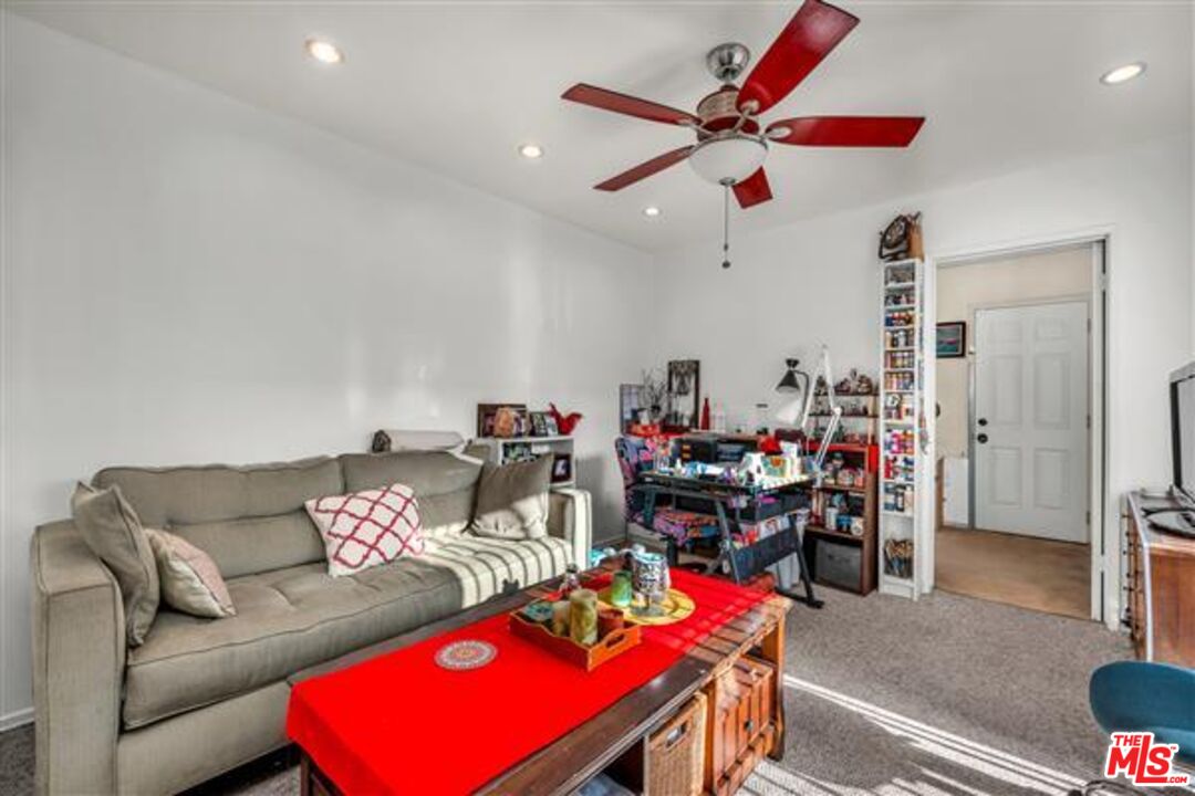 5118 Randall Street Los Angeles, CA 90230 - Photo 19 of 26 a living room with furniture and kitchen view