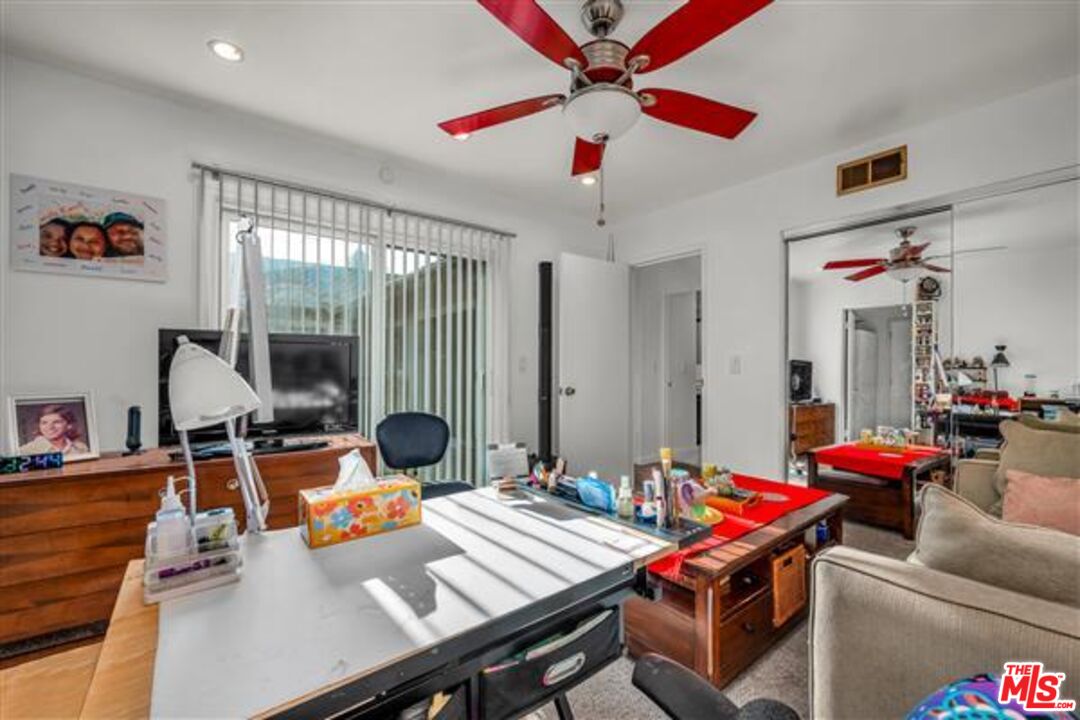 5118 Randall Street Los Angeles, CA 90230 - Photo 20 of 26 a view of a workspace with furniture and a window