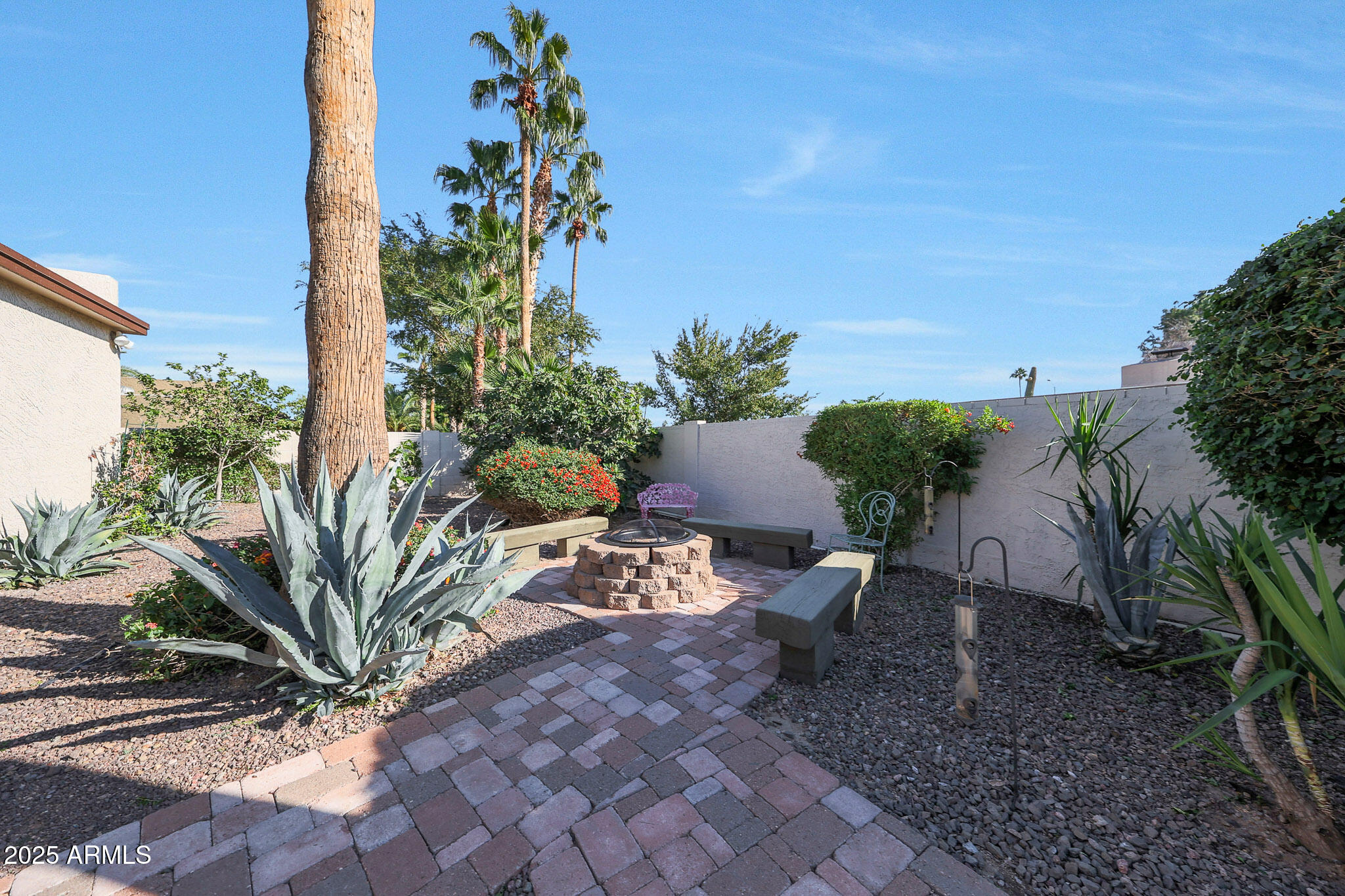 6811 East Hearn Road Scottsdale, AZ 85254 - Photo 12 of 48 Paver sidewalk to fire pit.