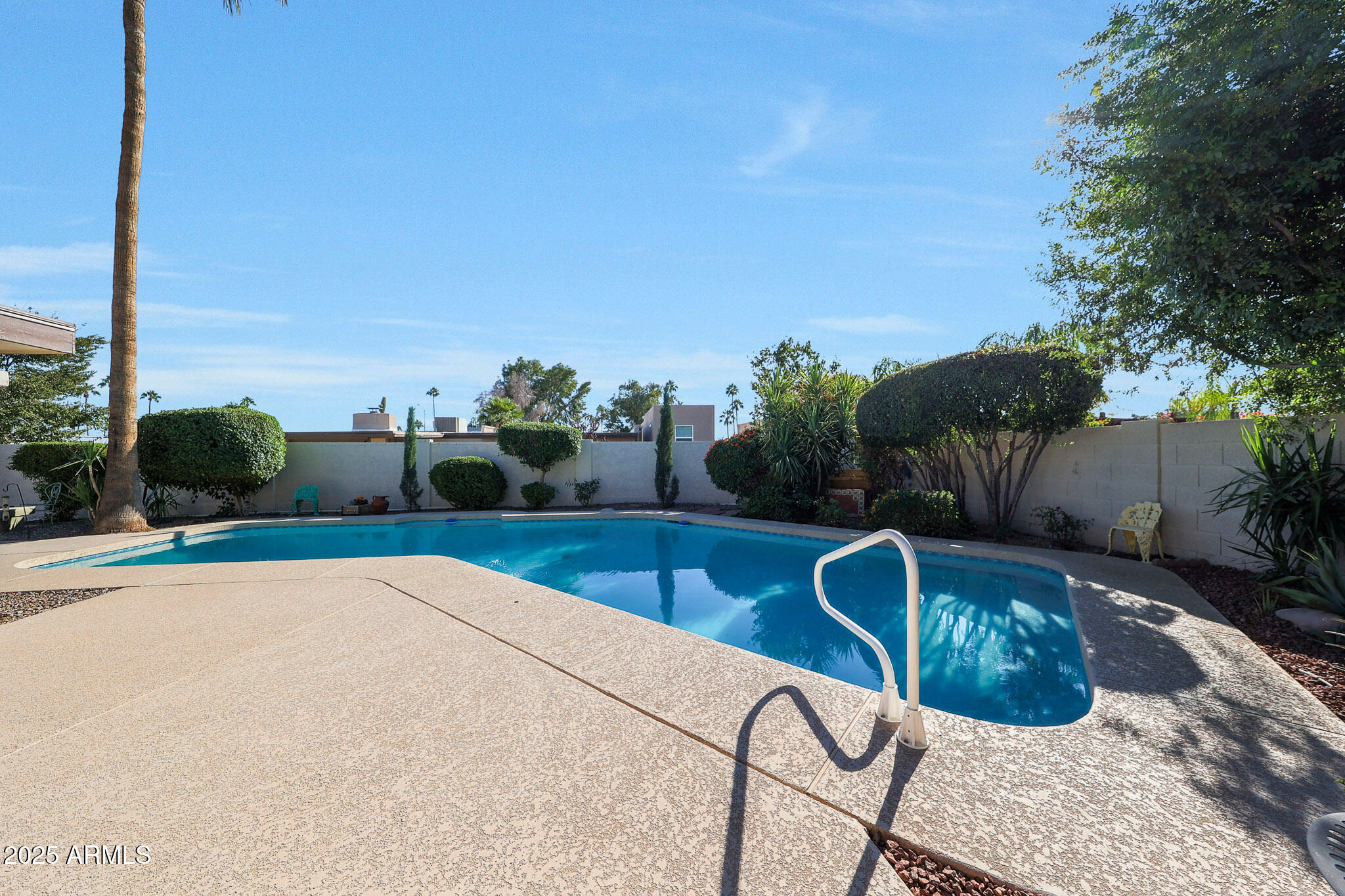 6811 East Hearn Road Scottsdale, AZ 85254 - Photo 43 of 48 Pool with railing for safe access.