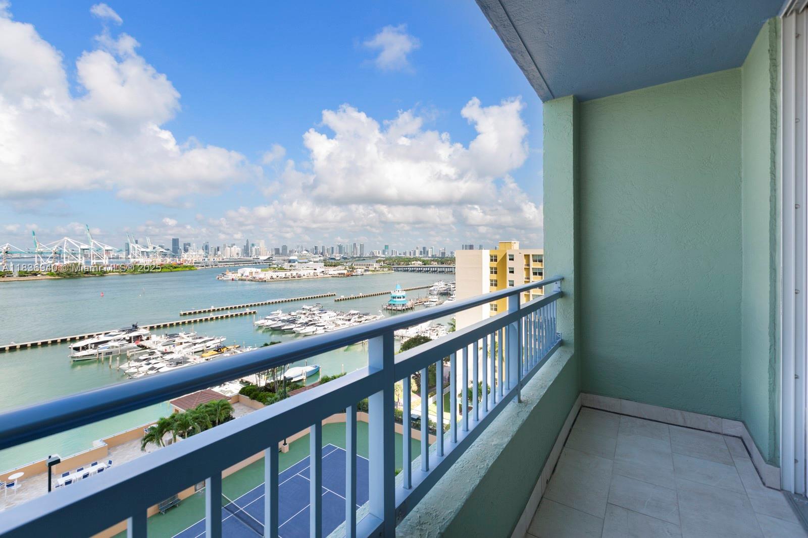 90 Alton Road, Unit 1408 Miami Beach, FL 33139 - Photo 7 of 15 a view of city from a balcony