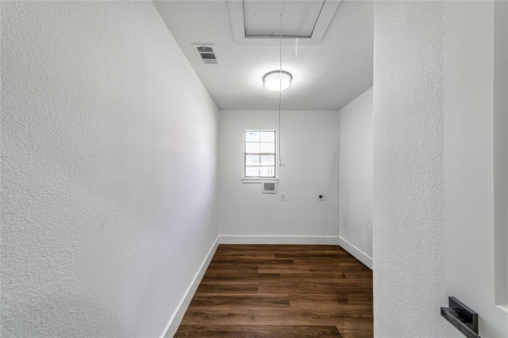 403 Melody Circle Kaufman, TX 75142 - Photo 13 of 25 a view of a hallway with wooden floor and entryway