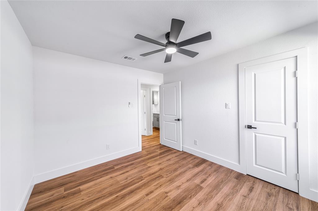 403 Melody Circle Kaufman, TX 75142 - Photo 18 of 25 a view of empty room with wooden floor