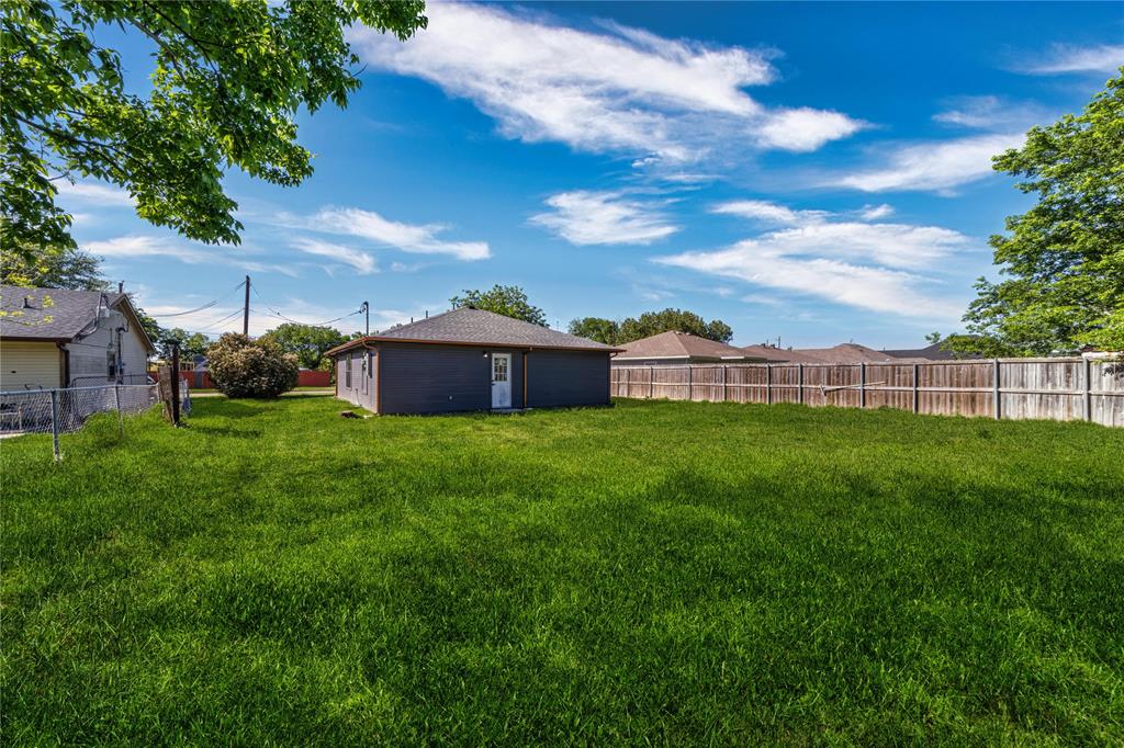 403 Melody Circle Kaufman, TX 75142 - Photo 24 of 25 a view of a house with a big yard and large trees
