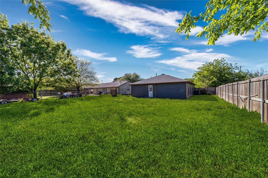 403 Melody Circle Kaufman, TX 75142 - Photo 25 of 25 a view of house with backyard
