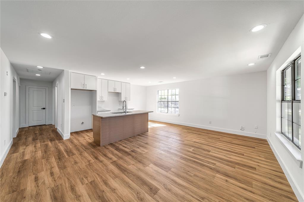 403 Melody Circle Kaufman, TX 75142 - Photo 3 of 25 a view of kitchen with wooden floor and electronic appliances
