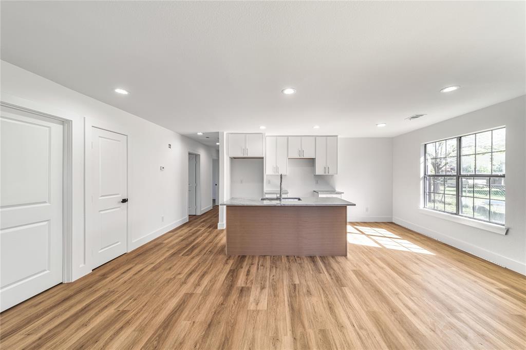 403 Melody Circle Kaufman, TX 75142 - Photo 4 of 25 a view of kitchen with sink refrigerator and window