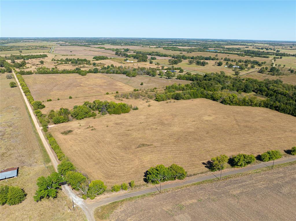12 Fm 2675 Roxton, TX 75477 - Photo 3 of 8 an aerial view of ocean and residential houses with outdoor space